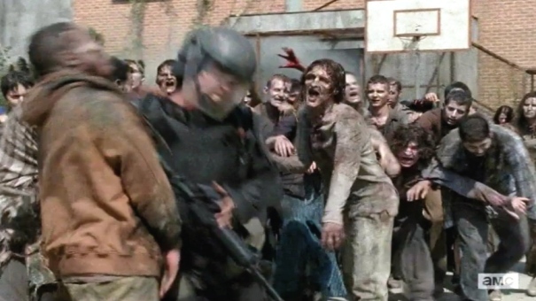 Glenn charges through a herd of walkers. Let's see if he actually makes it out of there unscathed...
